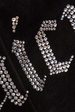 Displays the Black 'Juicy' branded diamanté capri featuring the juicy branding 