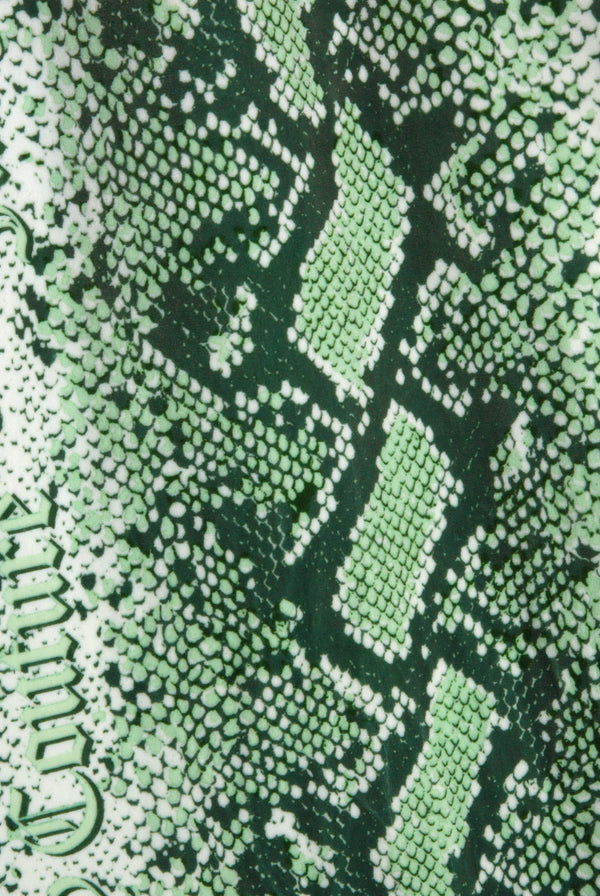 Display the green snake print 'Juicy' branded diamanté low rise track bottom featuring the juicy branding  
