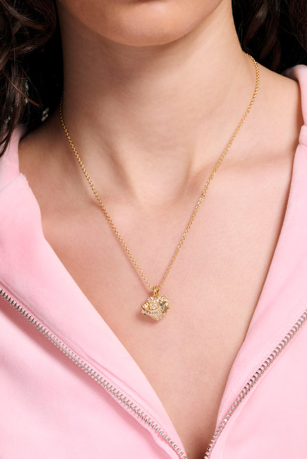 Displays the model wearing the Gold Tone 'Juicy' branded crystal icon heart pendant necklace