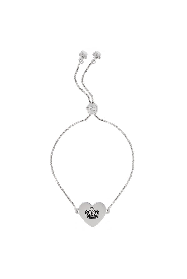 Displays the silver tone 'Juicy' branded reversible heart adjustable bracelet 