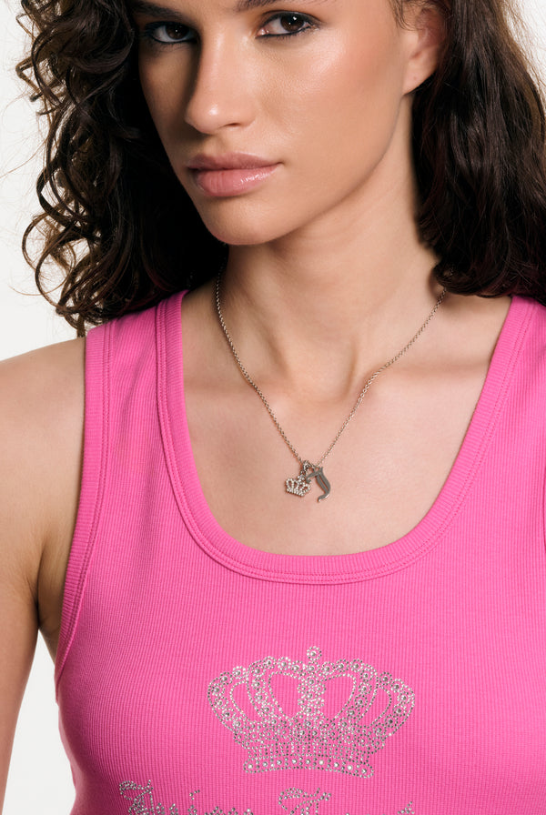 Displays a model wearing the Silver Tone 'Juicy' branded crystal motif crown and J Charm pendant 