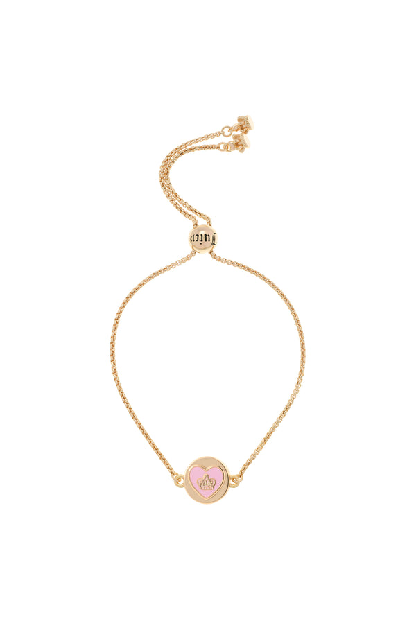 Displays the Gold tone 'Juicy' branded love juicy reversible enamel adjustable bracelet 