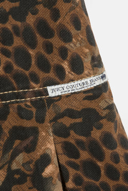 Displays the Animal 'Juicy' branded denim bandeau mini dress featuring the juicy couture jeans branding 