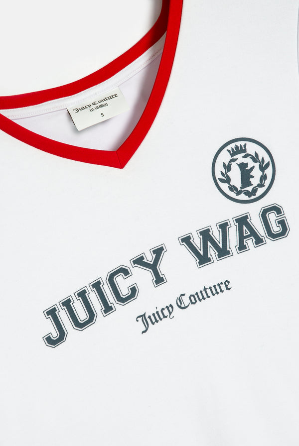 Displays a model wearing the White 'Juicy' branded Juicy Wag V Neck T-Shirt featuring the juicy wag branding 
