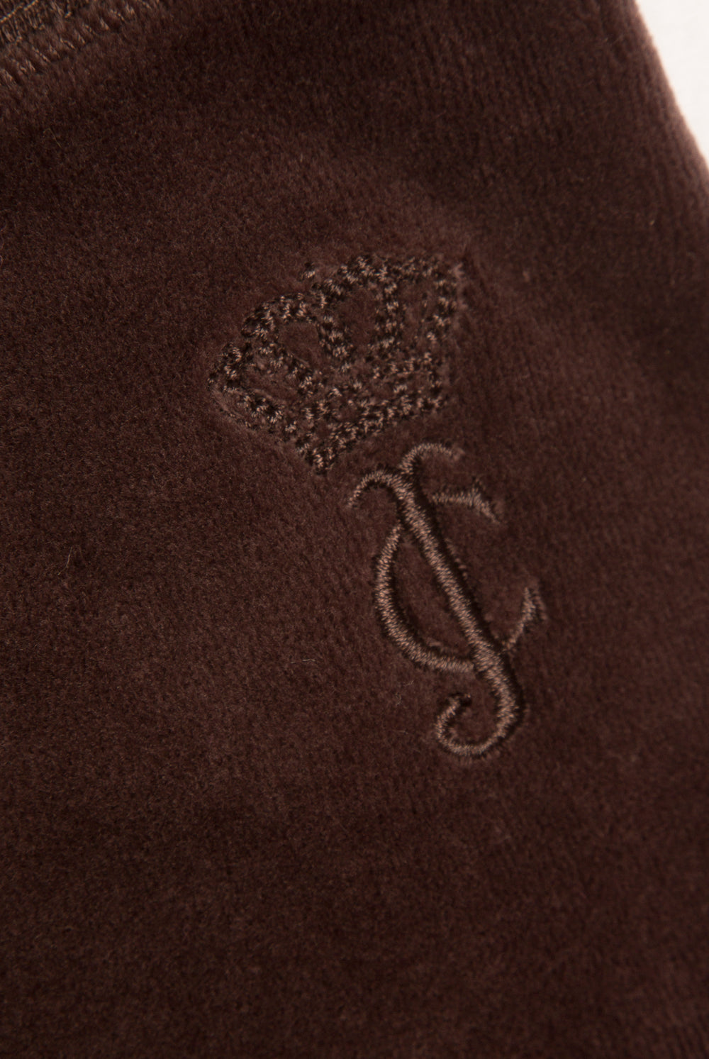 Displays the Java 'Juicy' branded OG straight pocketed capri pants featuring the juicy couture branding