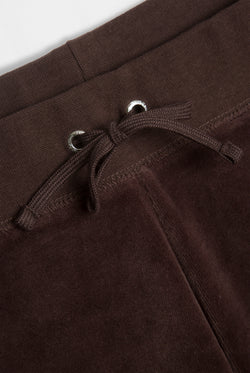 Displays the Java 'Juicy' branded OG straight pocketed capri pants featuring the close up on the details 