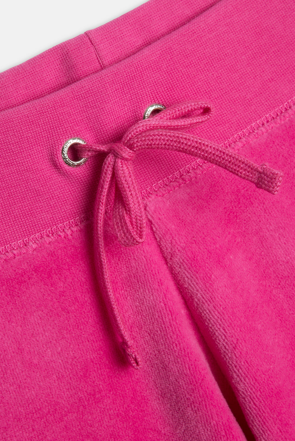 Displays the Nostalgia Pink 'juicy' branded OG straight pocketed capri pants featuring the details 