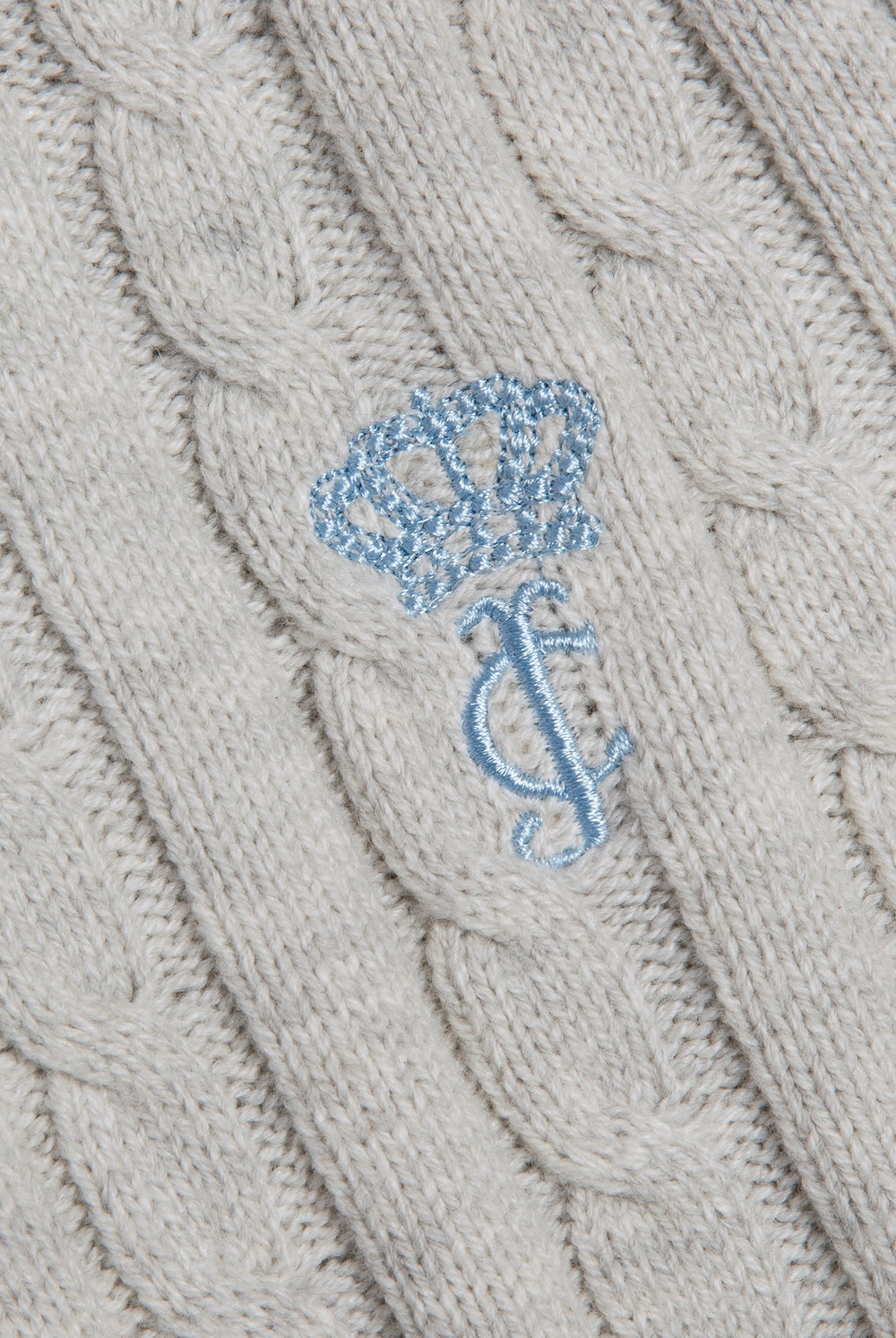 Displays the Silver Marl 'Juicy' branded Cable Knit Zip Up Hoodie featuring the juicy branding 
