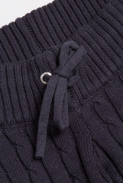 Displays the Night Sky 'Juicy' branded Cable Knit Straight Leg Pants featuring the close up on the straw string 