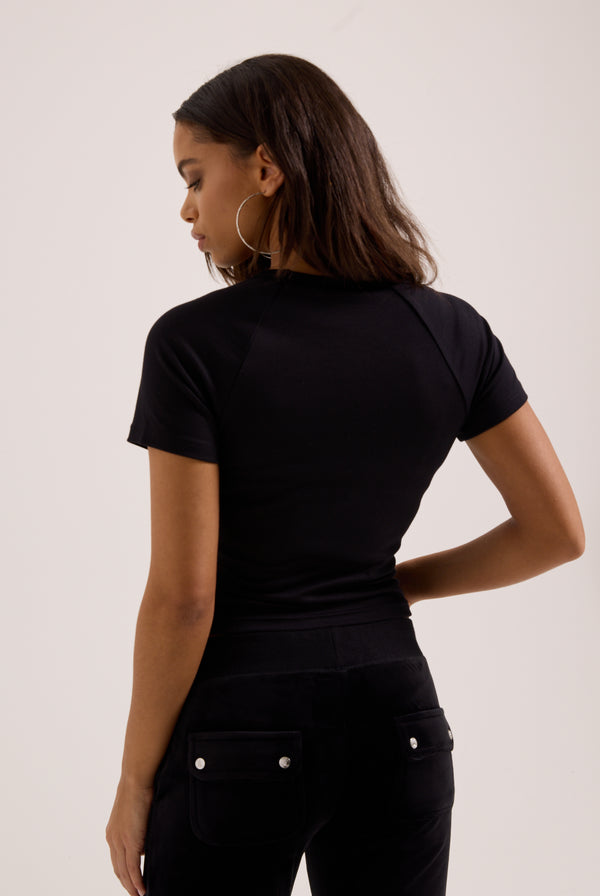 Displays a model wearing the Black 'Juicy' branded raglan diamanté baby tee 