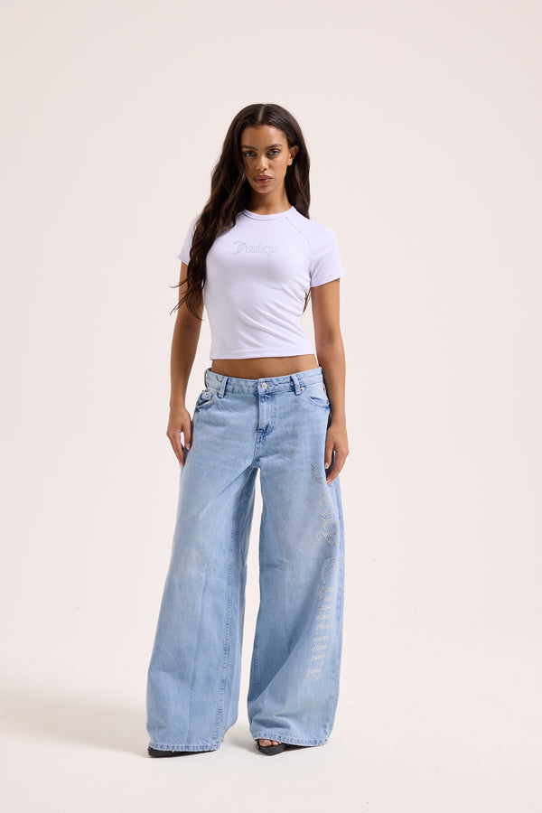 Displays a model wearing the White raglan 'Juicy' branded diamanté baby tee 
