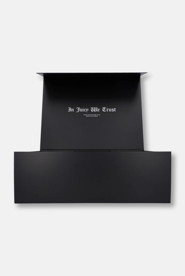 Displays the 'Juicy Couture' Gift Wrapping packaging 