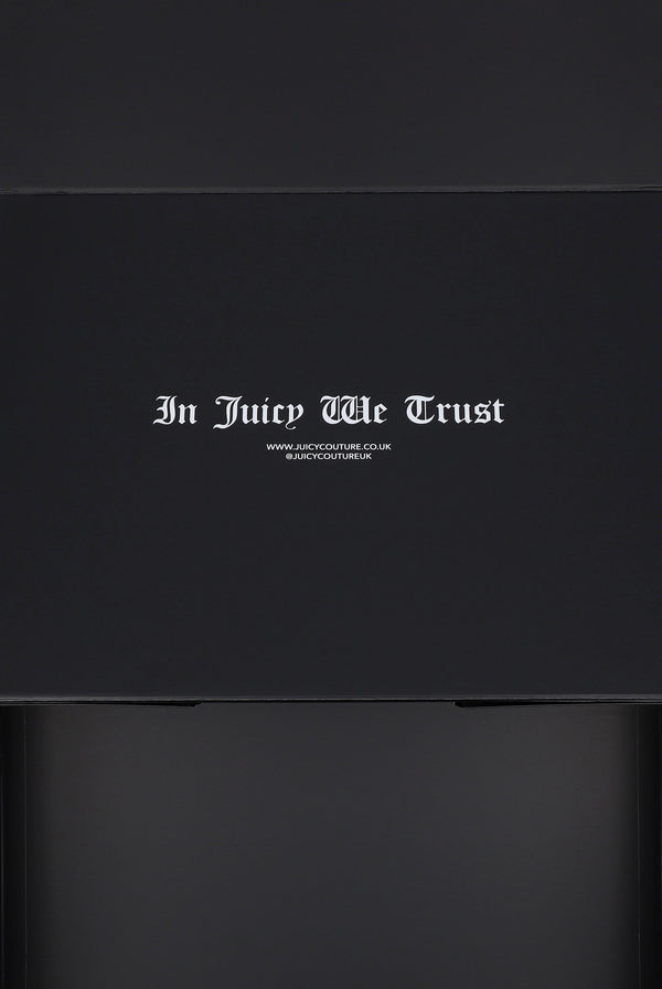 Displays the 'Juicy Couture' Gift Wrapping packaging 