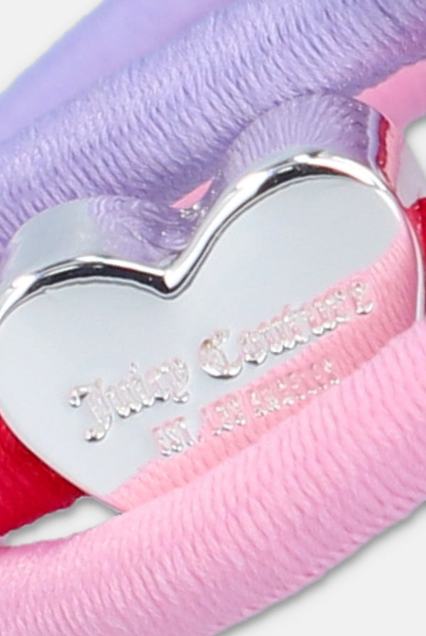 Displays the 'Juicy' branded Juicy Heart hair band set featuring the charm branding 