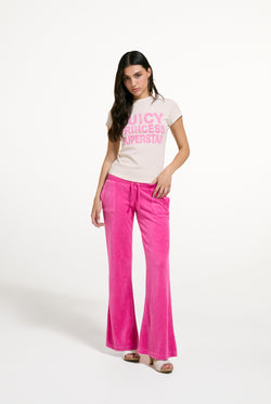 Displays a model wearing the White 'Juicy' branded Princess Superstar Washed T-Shirt