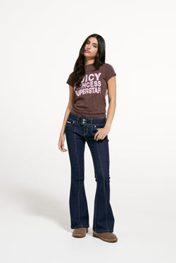 Displays a model wearing the Java 'Juicy' branding Princess Superstar Washed T-Shirt
