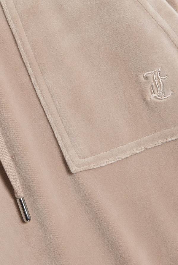 Displays the String 'Juicy' branded low rise flare pocket classic velour track pant featuring the juicy branding 