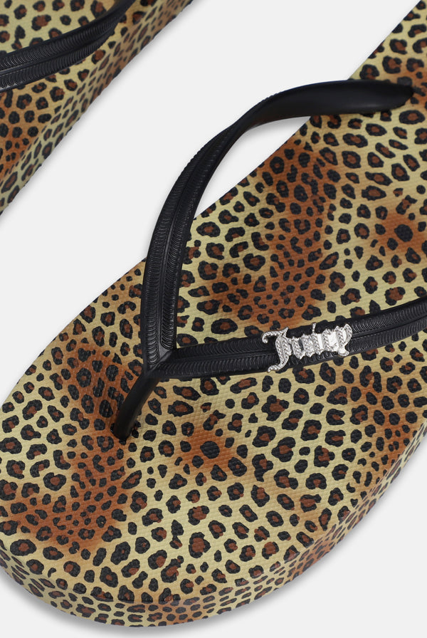 Displays the Leopard Print 'Juicy' branded platform flip flop 