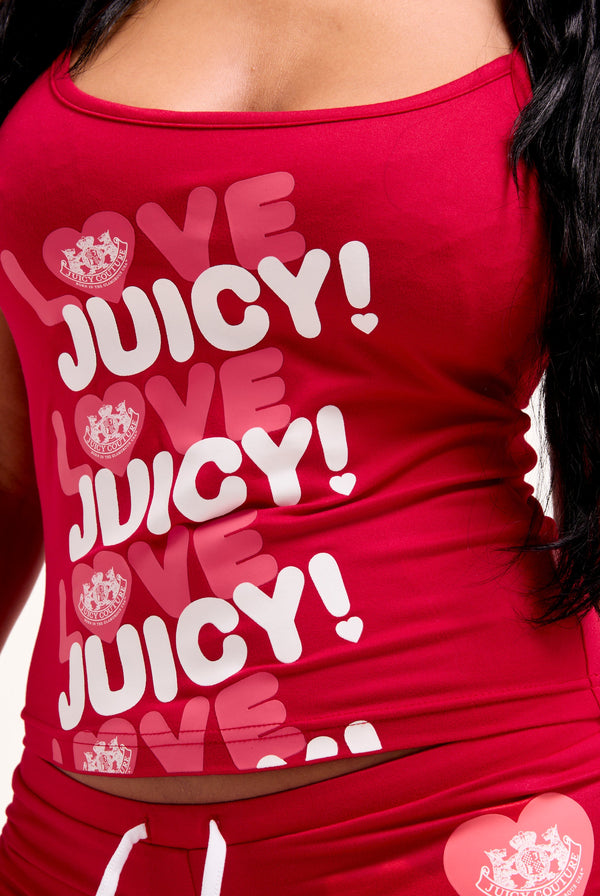 Displays a model wearing the Toreador 'Juicy' branded Love Juicy vest and short PJ set 