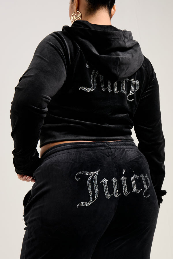 Black velour tracksuit with diamanté embellishments, mid-rise fit, and adjustable drawstring waist.