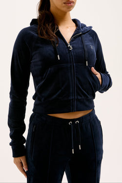 Displays a model wearing the Night Sky Diamanté 'Juicy' branded velour zip-through hoodie  
