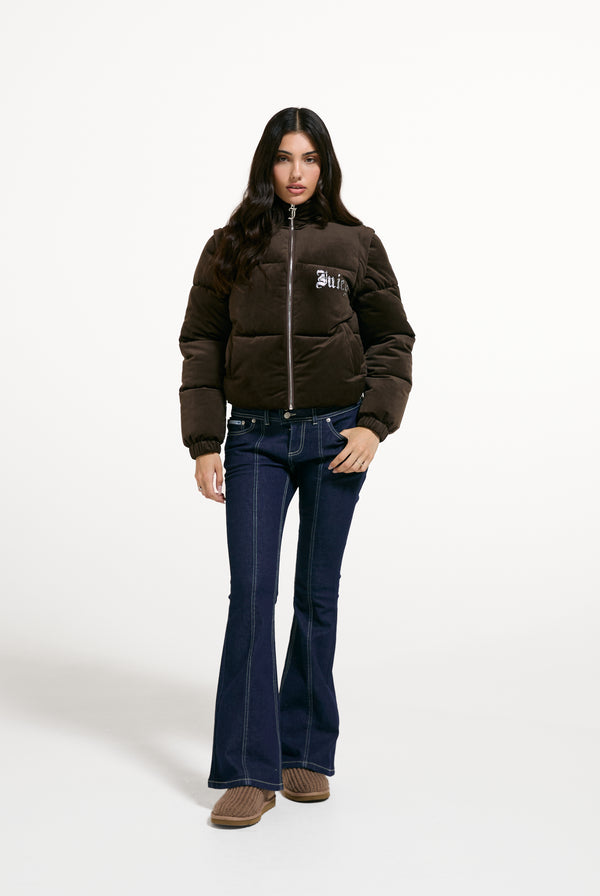 Displays a model wearing the Java 'Juicy' branded Old Gothic Diamanté Puffa Jacket
