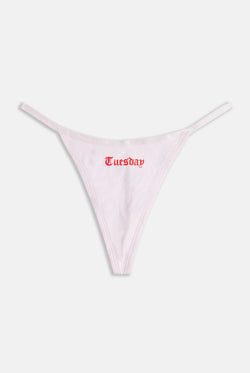 Displays the 'Juicy' branded Tuesday gothic print thong
