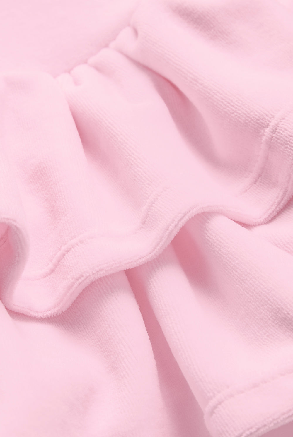 Displays the Cherry Blossom 'Juicy' branded Cotton Velour Ruffle Skirt featuring the close up on the details