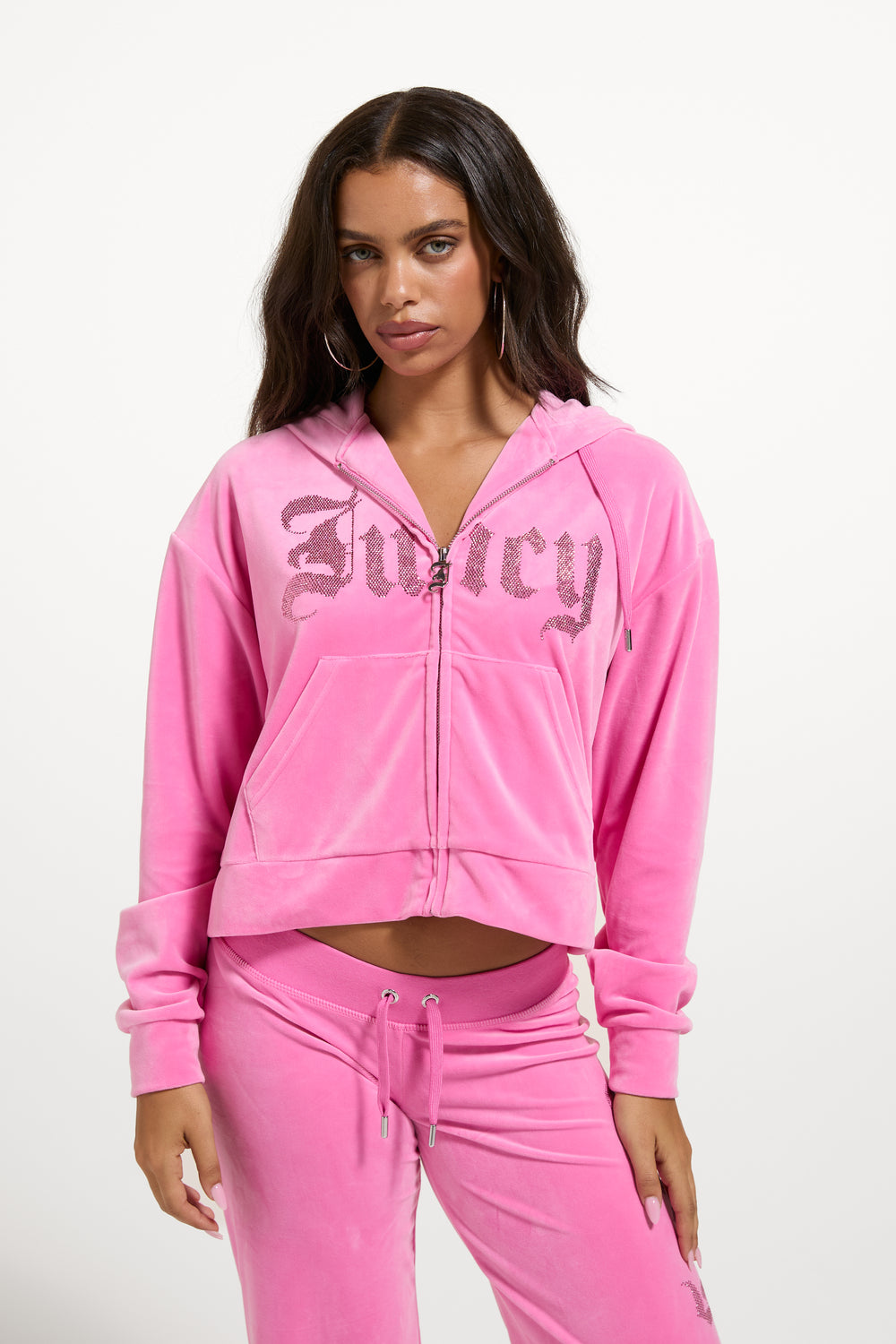 Displays a model wearing the Wild Orchid 'Juicy' branded Old Gothic Oversized Cropped Hoodie