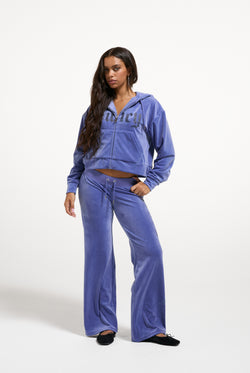 Displays a model wearing Greyblue 'Juicy' branded Old Gothic Oversized Cropped Hoodie