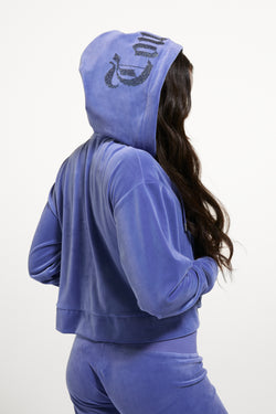 Displays a model wearing Greyblue 'Juicy' branded Old Gothic Oversized Cropped Hoodie