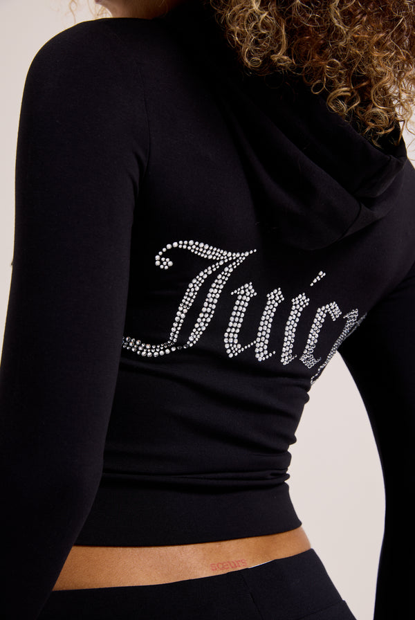 Displays a model wearing the Black 'Juicy' branded diamanté luxury jersey zip-through hoodie featuring the juicy branding 