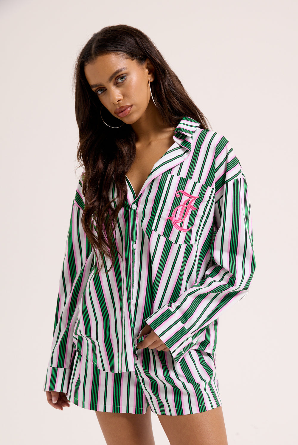 Displays a model wearing the Green stripe 'juicy' branded cotton sleep shirt 