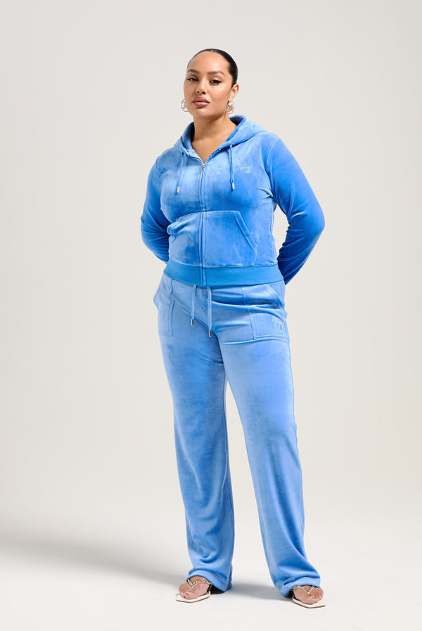 Displays a model wearing the Regatta 'Juicy' branded classic velour Robertson hoodie 
