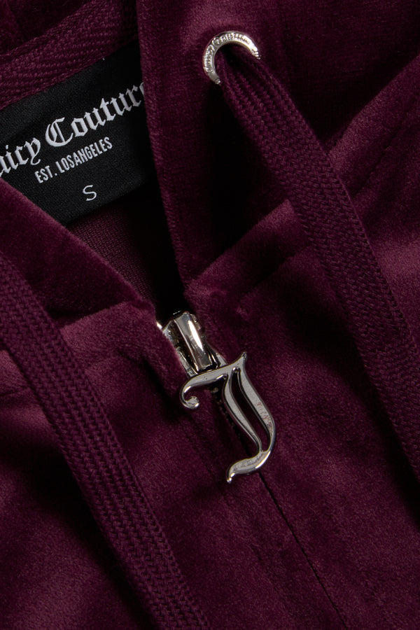 Displays the wine tasting classic 'juicy' branded velour Robertson hoodie featuring the juicy zip 