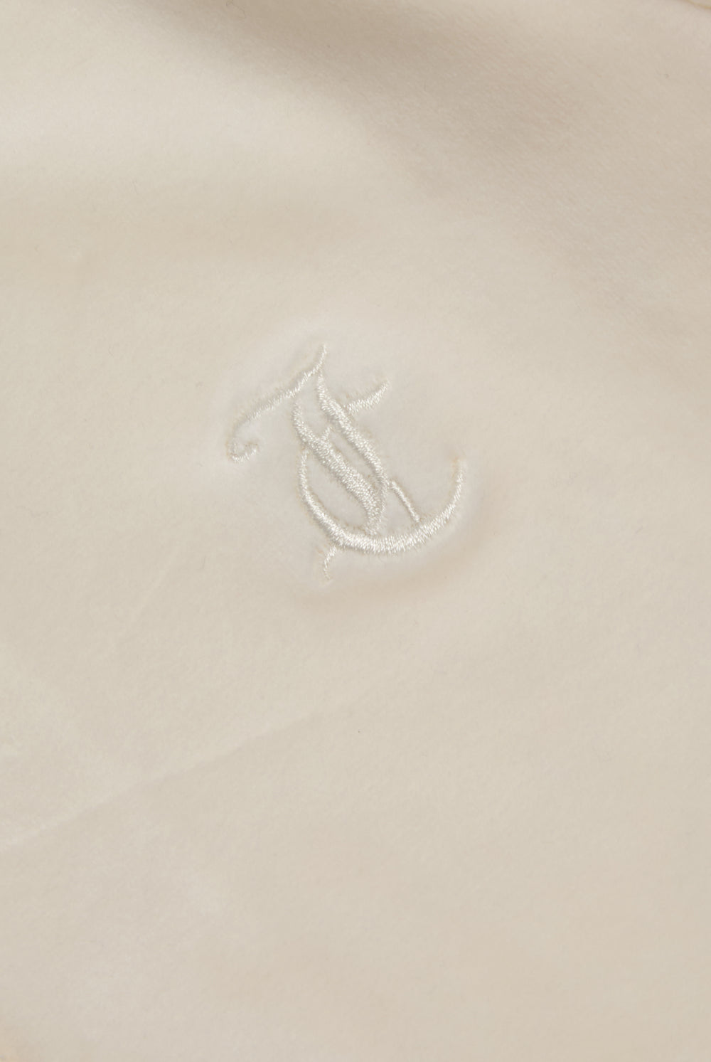 Displays the cream classic 'Juicy' branded velour Robertson hoodie featuring the juicy logo