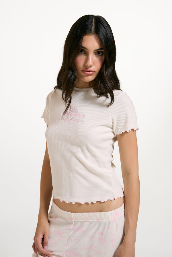 Displays a model wearing the Marshmallow 'Juicy' branded Rose Rib Pyjama Set
