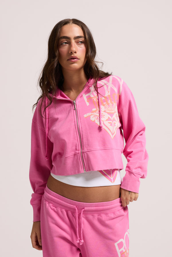 Displays a model wearing the Pink Azalea Roxy & juicy Couture boxy hoodie 