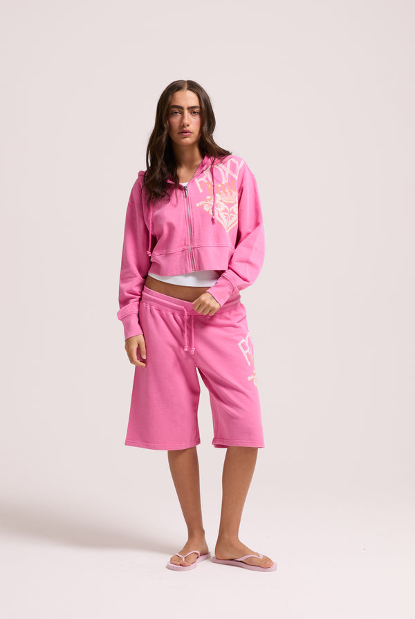 Displays a model wearing the Pink Azalea Roxy & Juicy Couture relaxed jorts 