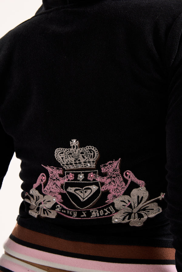 Displays a model wearing the Black Roxy & Juicy Couture Terry towelling hoodie featuring the Roxy x juicy branding