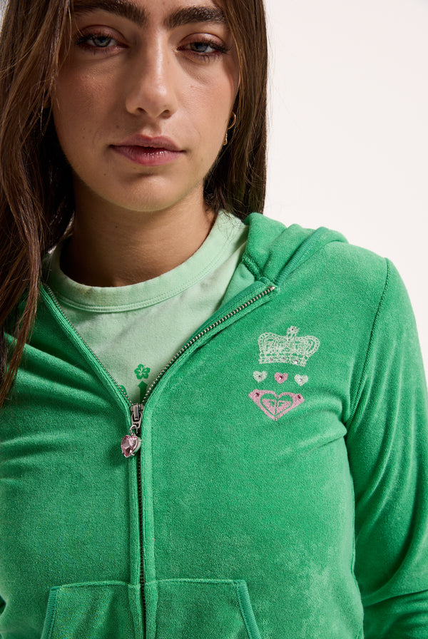 Displays a model wearing the island green Roxy & Juicy Couture Terry towelling hoodie 
