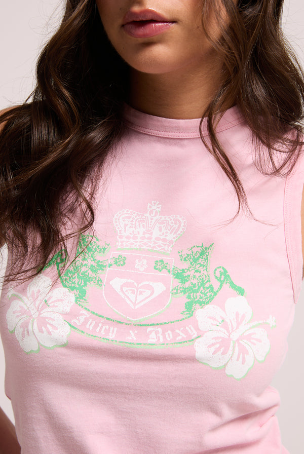 Displays a model wearing the Candy Pink Roxy & Juicy Couture crest tank top featuring the juicy x Roxy logo