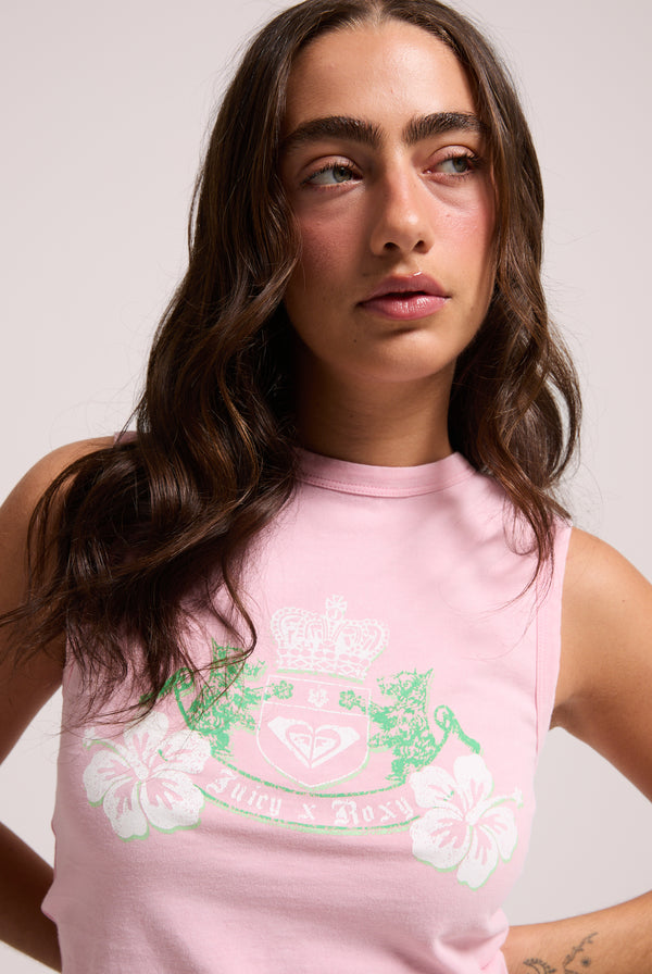 Displays a model wearing the Candy Pink Roxy & Juicy Couture crest tank top 