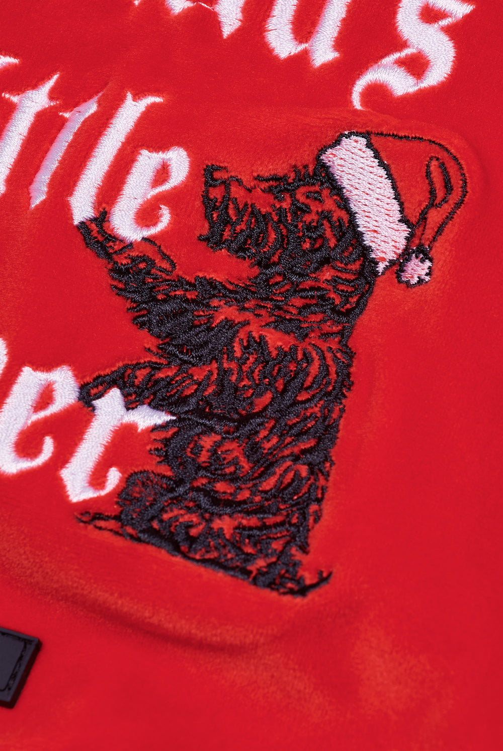 Displays the Toreador 'Juicy' branded Santa's Little Helper Pet Hoodie featuring the details on the branding 