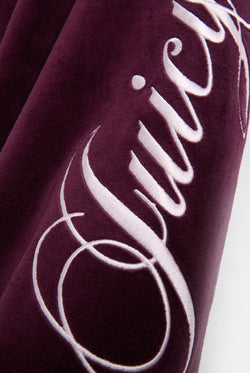 Displays the Winetasting 'Juicy' branded Cotton Velour Ultra Lowrise Straight Leg Trackpant