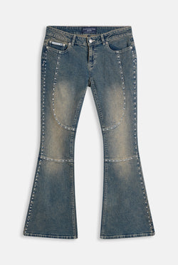 Displays the Mid Wash 'Juicy' branded Sand Stud Moto Bootcut Jeans