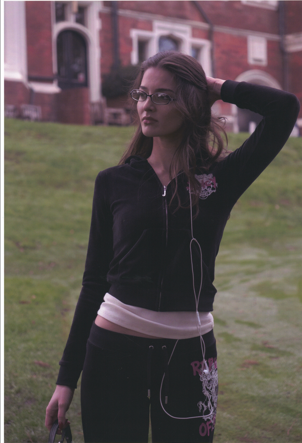 Displays a model wearing the Black Juicy Couture & Roxy Republic of heritage hoodie 