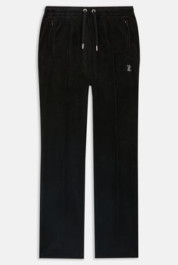 Black velour tracksuit bottoms with Juicy Couture branding on a white background