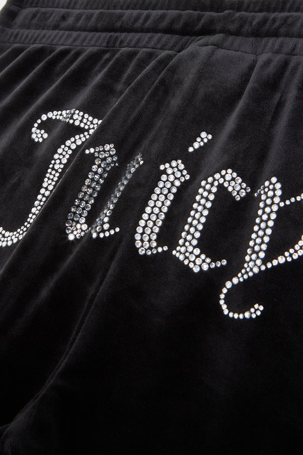 Displays the Black 'Juicy' branded velour tracksuit bottoms featuring the juicy branding 