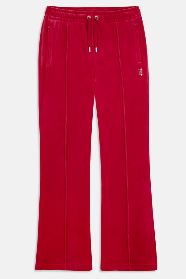 Displays the Astor Red Velour 'Juicy' branded Diamanté tracksuit bottoms 